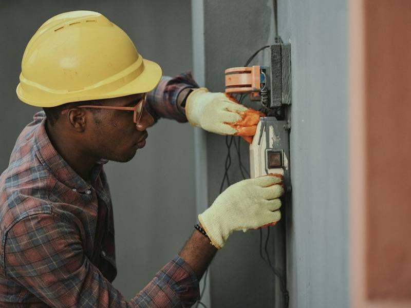 Home service technician at work on equipment