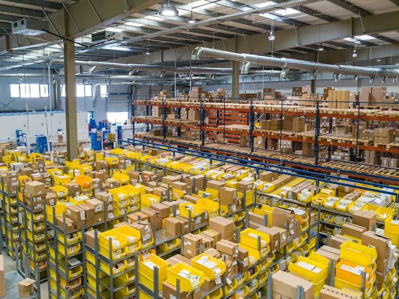 Distribution warehouse with stocked shelves